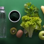 assorted fruits and vegetables on green surface